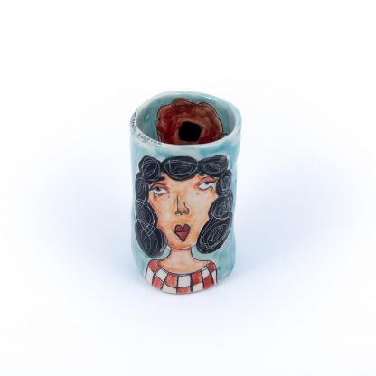 blue pottery wine glass with painted woman portrait