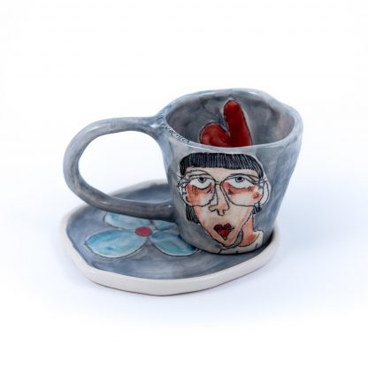 handpainted old lady on pottery espresso cup